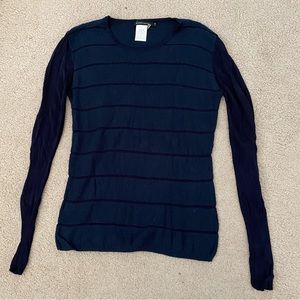 Small navy blue long sleeve shirt